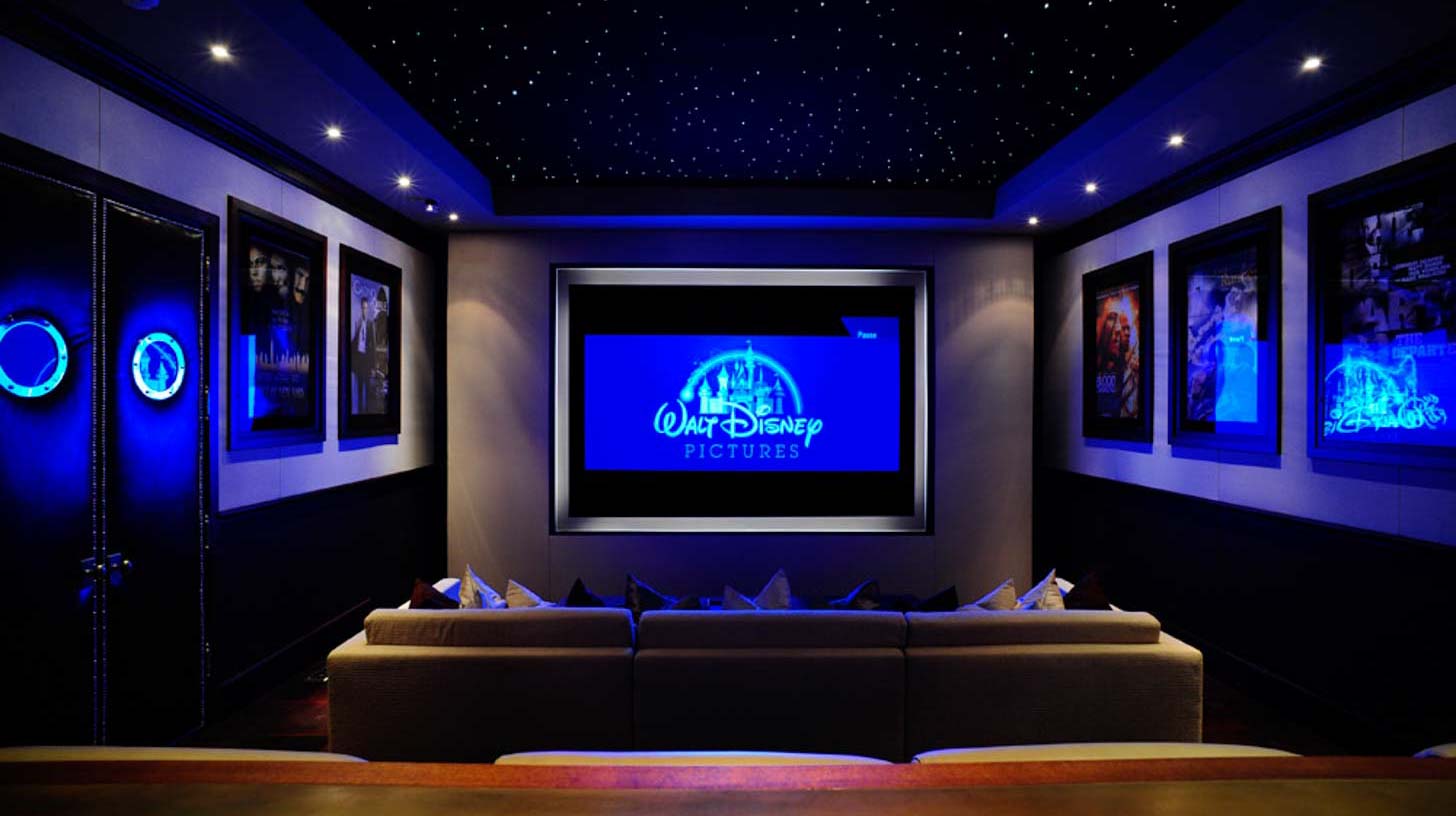 Home theater with Acoustical Treatment, star ceiling, and impressive projector screen.